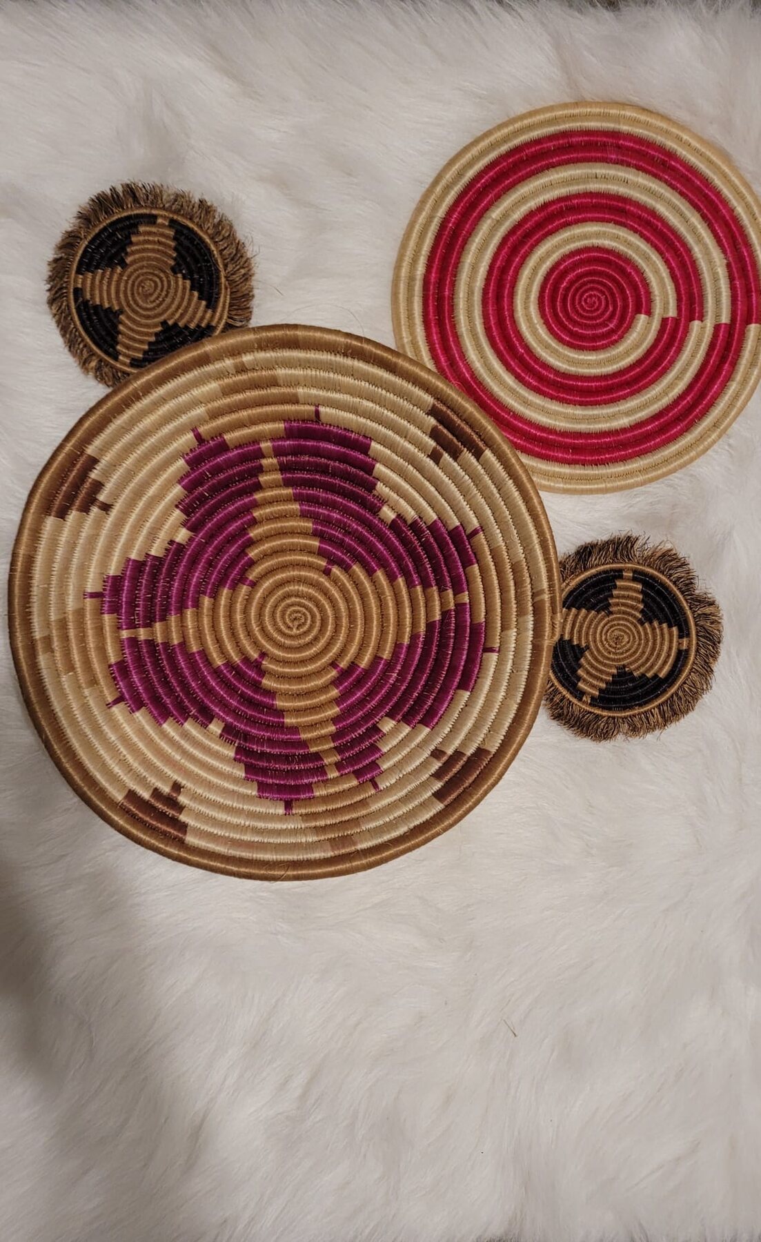 Purple basket, pink flat mat, and small coasters