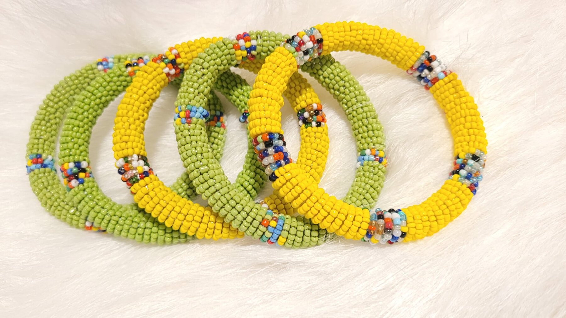 Green and yellow beaded bracelets